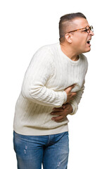Fototapeta premium Middle age arab man wearing glasses over isolated background with hand on stomach because nausea, painful disease feeling unwell. Ache concept.