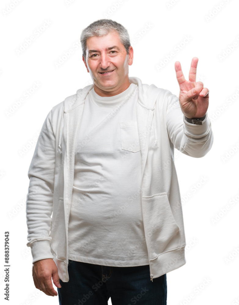 Sticker handsome senior man wearing sport clothes over isolated background smiling with happy face winking a