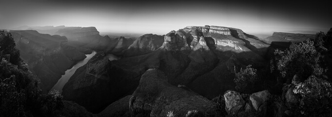 Beautiful panoramic sunset view of 3 rondawels in Sabie in South Africa.