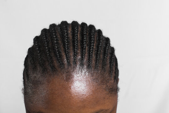 Brown skin woman with straight back cornrows, cornrow braids on brown skin, african american woman with cornrowed hair