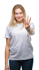 Obraz premium Young caucasian woman over isolated background showing and pointing up with fingers number three while smiling confident and happy.