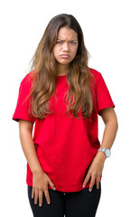 Fototapeta premium Young beautiful brunette woman wearing red t-shirt over isolated background skeptic and nervous, frowning upset because of problem. Negative person.