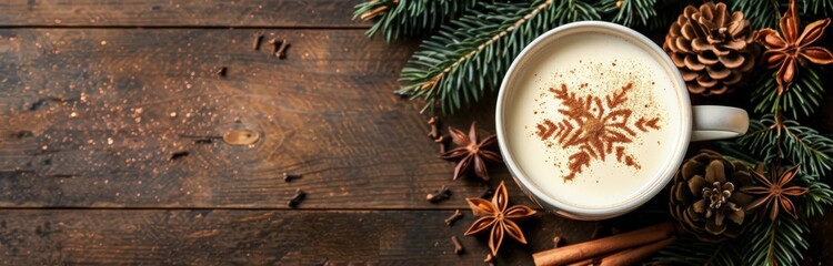 Eggnog With Cinnamon Snowflake Design on Wooden Tabletop With Pine Branches