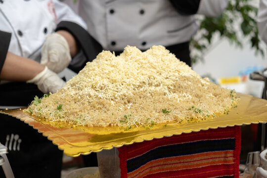 a mountain of quinoa in the shape of the illimani bolivia in latin america - gastronomy concept