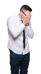 Young handsome business man wearing glasses over isolated background with sad expression covering face with hands while crying. Depression concept.