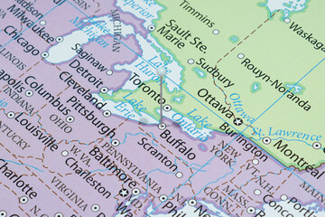 Close up to a Buffalo city with a white pin needle into United States of America country political map 