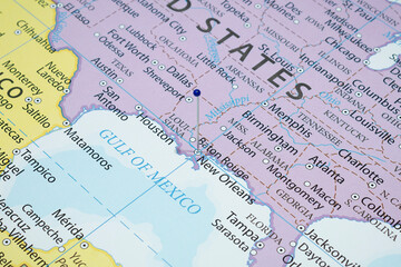 Close up to a New Orleans city with a blue pin needle into United States of America country political map 