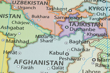 Close up to a Mazar i Sharif city with a white pin needle into Afghanistan country political map 