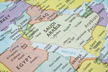 Close up to a Medinah city with a green pin needle into Saudi Arabia country political map 
