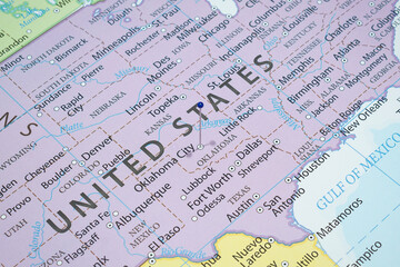 Close up to a Oklahoma City with a blue pin needle into United States of America country political...