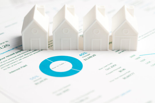 Mortgage loan statement with white house model
