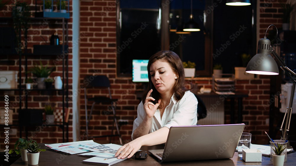Aufkleber woman answers phone call from husband while working in office at computer desk. employee using smart