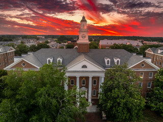 Aerial view of Virginia Hall, central building of Virginia State University public historically Black land-grant university in Ettrick with dramatic colorful sunset sky