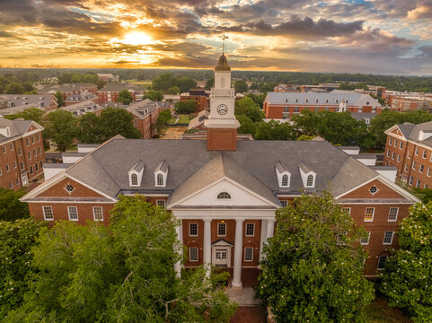 Aerial view of Virginia State University in Petersburg, Virginia Hall central building with stunning dramatic colorful sunset sky
