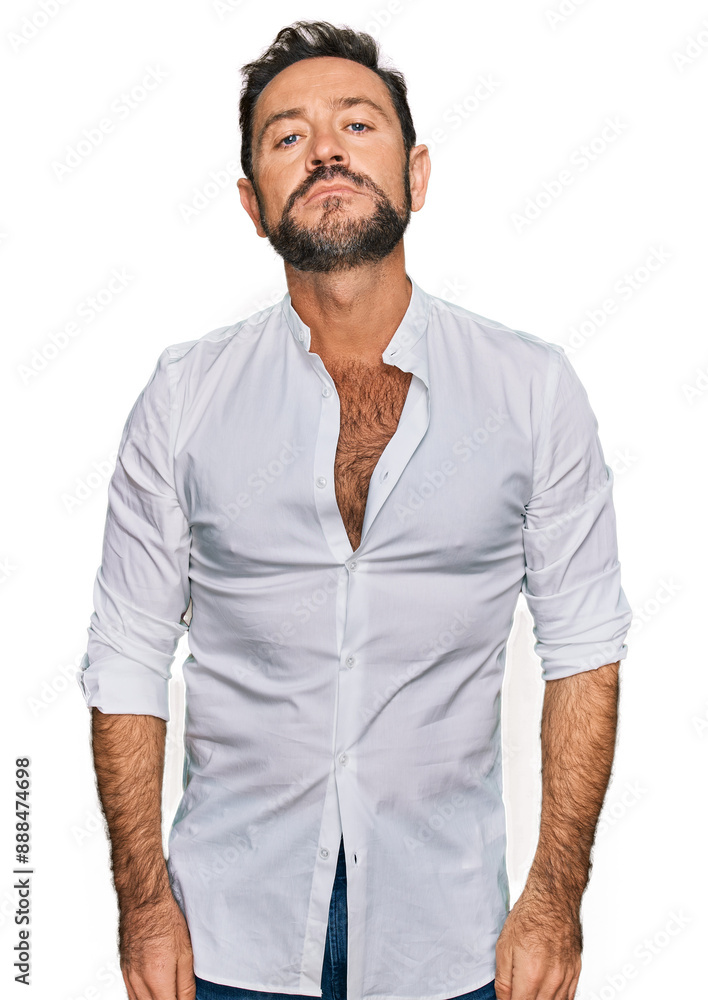 Sticker Middle age man wearing casual clothes relaxed with serious expression on face. simple and natural looking at the camera.