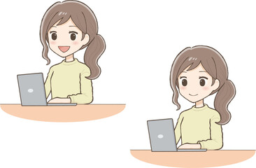 黄色い服を着た女性がパソコン操作をしている