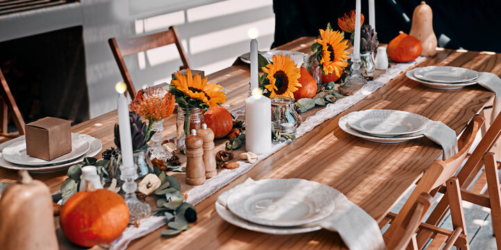Table, thanksgiving and decoration for celebration in home, dining and traditional place setting. Party, festive season and preparation for social event, fancy tableware and gathering for hosting