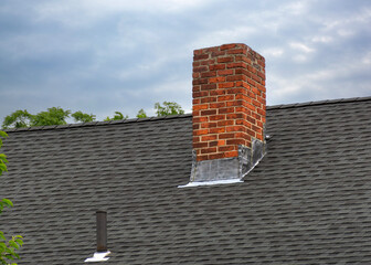 Close-Up of a House Rooftop with Brick Chimney and Vent, Brighton, MA, USA