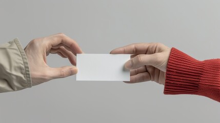 Obraz premium Close-up of hands handling a business card exchange, capturing the moment of networking and professional introduction. Height Resolution Photo, , Minimalism,