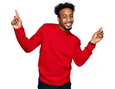 Young african american man with beard wearing casual winter sweater smiling confident pointing with fingers to different directions. copy space for advertisement