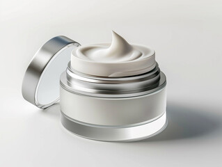 glass jar of beauty cream with silver lid resting on the side and reflected in the white plane