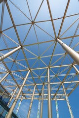 Metal modern architecture elements on sky background