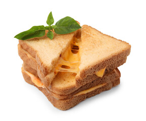 Pieces of toasted bread with melted cheese and basil isolated on white