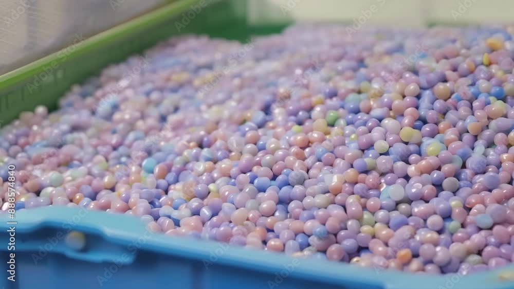 Poster the vibrant array of colors seen in the raw plastic pellets waiting to be transformed into a molded 