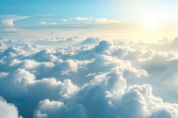 Naklejka premium Flying over heavenly beautiful cloudscape. Picturesque panorama of dense fluffy clouds softly lit by the sun