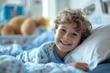Fototapeta premium Kid patient smiling while lying in a bright modern hospital bed, depicting a healthcare concept