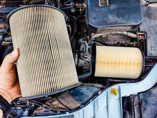 Replacement of car air filter element comparison between old and new