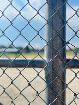 baseball field on sunny day with clouds and empty space