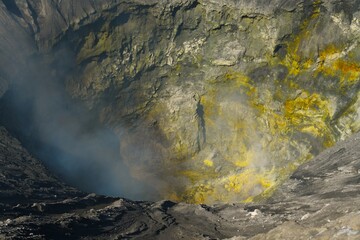 Detailed view into the Mount Bromo (an active somma volcano, elevation 2329 metres) crater taken from its rim (Bromo Tengger Semeru National Park, East Java, Indonesia)