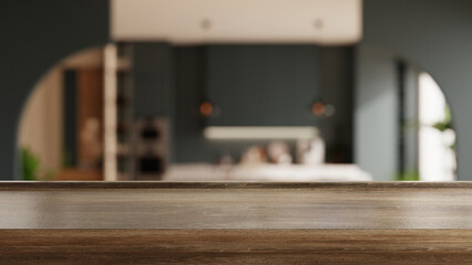 Wooden table top on blur kitchen room background, showcasing a modern and sleek kitchen design with dark cabinetry- 3D rendering