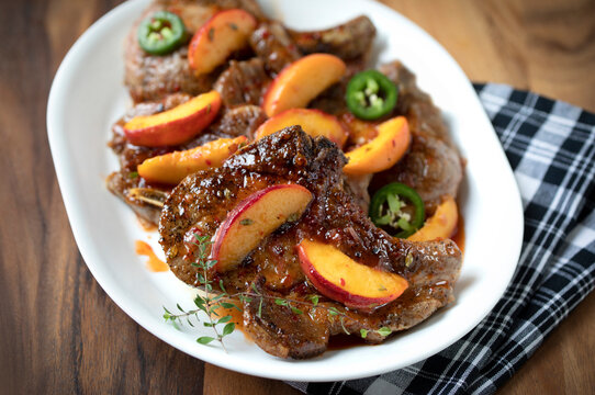 PEACH AND PEPPER JELLY GLAZED PORK CHOPS