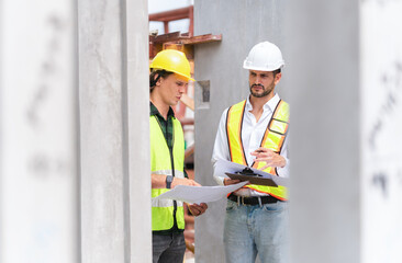 Engineer man in hardhat team working at construction site, Foreman worker inspect the construction site