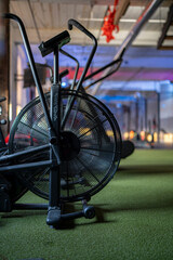 Indoor performance fitness studio assault bike closeup.