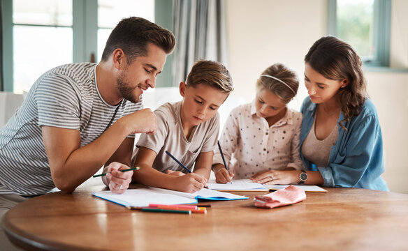 Parents, kid and help with homework in home for education, learning and support with care. People, family and school work with teaching for child development or growth for project, art and creativity