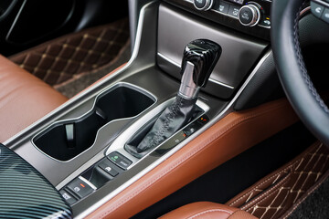 automatic transmission shift selector in the car interior. Closeup a manual shift of modern car...