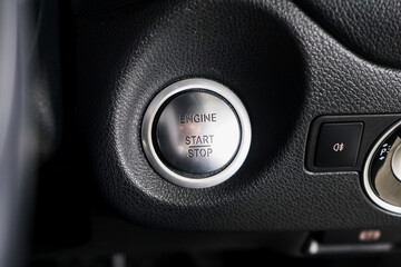 Close up engine car start button. Start stop engine modern new car button,Makes it easy to turn...