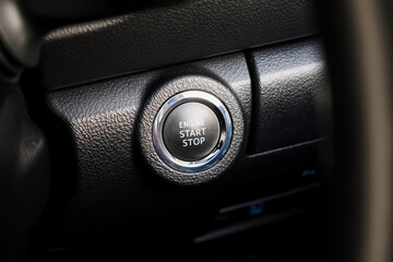 Close up engine car start button. Start stop engine modern new car button,Makes it easy to turn...