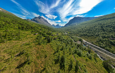 Venjedalsbu DNT in Andalsnes area in Norway with drone aerial view to the mountains in summer in Romsdalen vengedalen