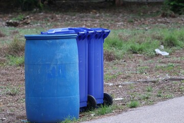 blue garbage bin