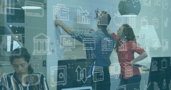 Image of multiple icons over diverse architects analyzing blueprint in office