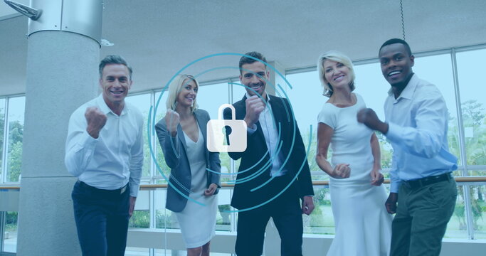 Image of padlock icon over diverse people in office