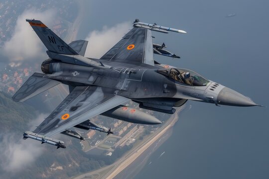 Royal netherlands air force f16 fighter jet soaring through the sky in a close up view