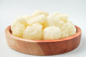 Geblek is a traditional food specialty from the regions of Kulon Progo, Purworejo Regency, and Wonosobo Regency, made from tapioca flour and fried with onion seasoning. Isolated on white background.