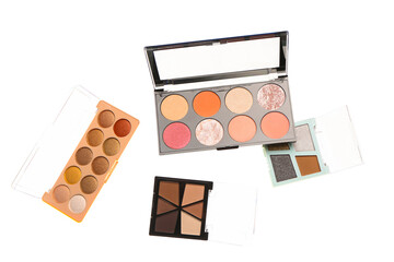 Different palettes of beautiful eyeshadows on white background