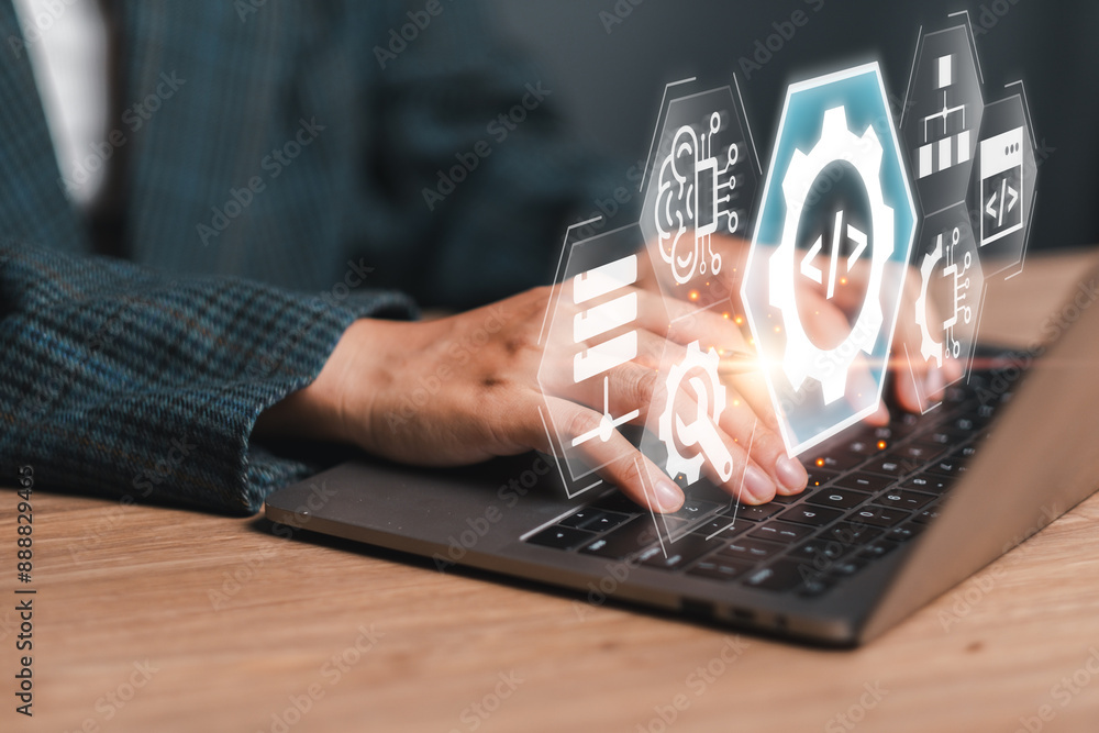Poster innovative low code platform concept with hands typing on laptop and futuristic digital interface ic