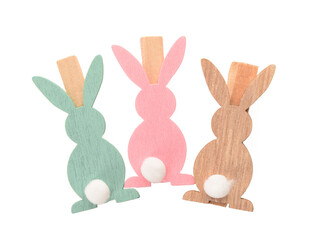 Clothes pegs with colorful hares on white background. Top view